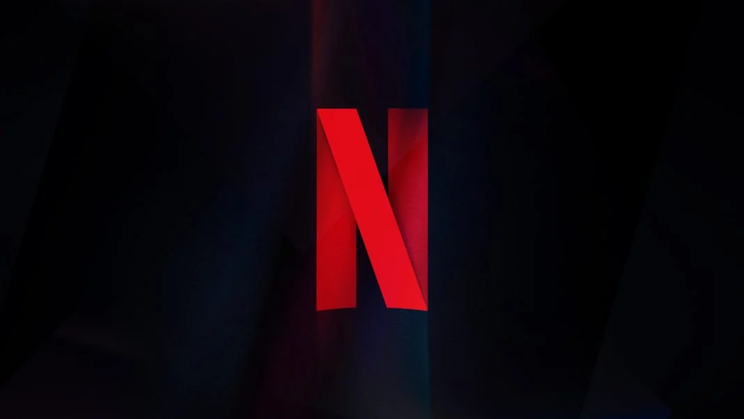 Logo vermelho da Netflix sobre fundo escuro, usado para ilustrar notícia sobre a compra da Warner Bros. Discovery.